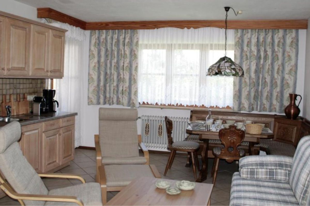 Airbnb apartment living and dining room — original photo