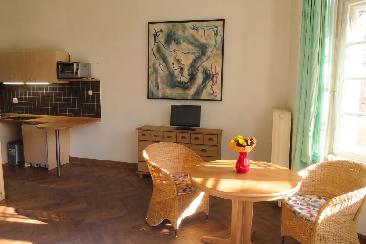 Vacation rental living room photo with enhanced lighting